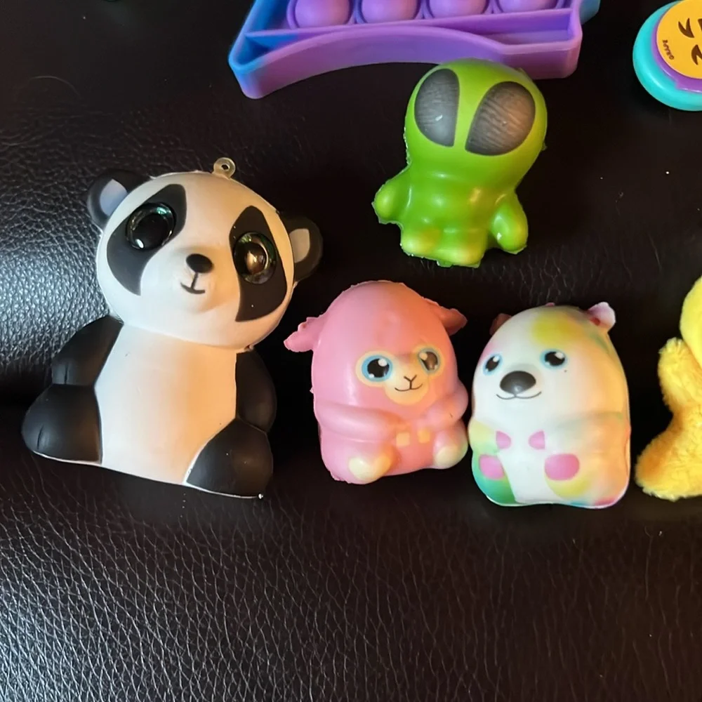 Bundle of squishies and Fidget and Animal Figures.